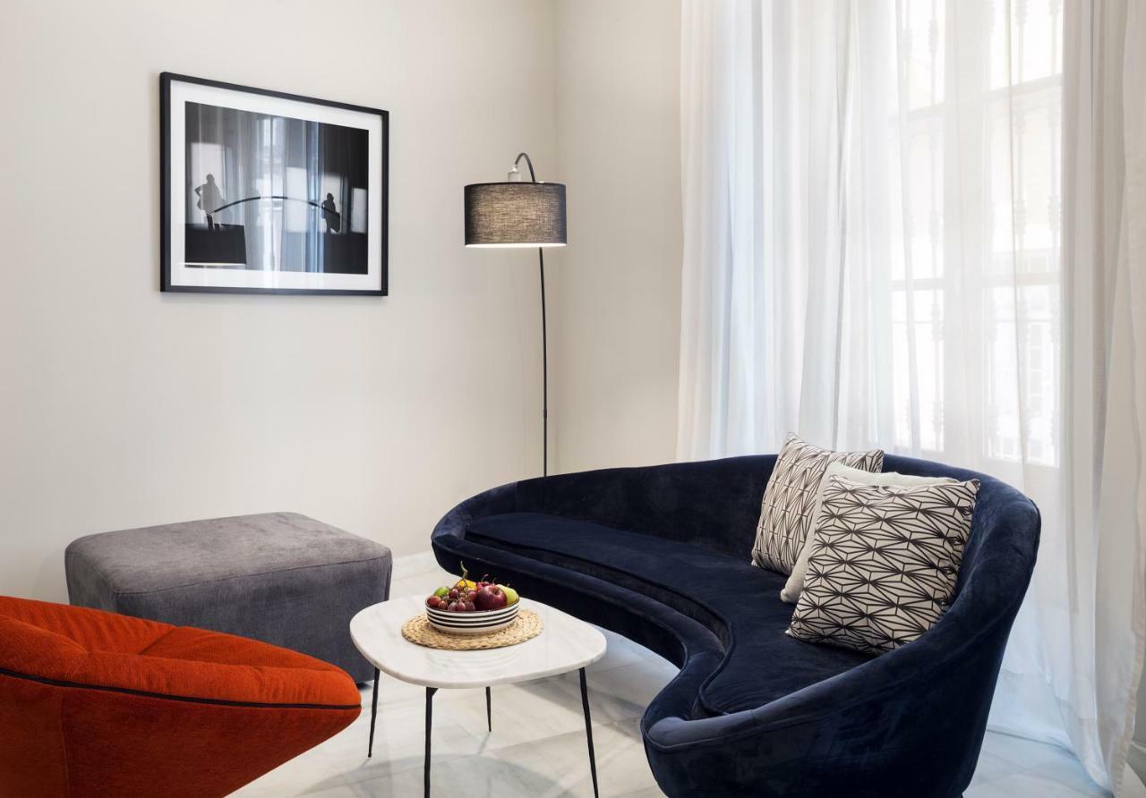 Apartamentos One Shot Conde De Torrejon Sevilla Buitenkant foto