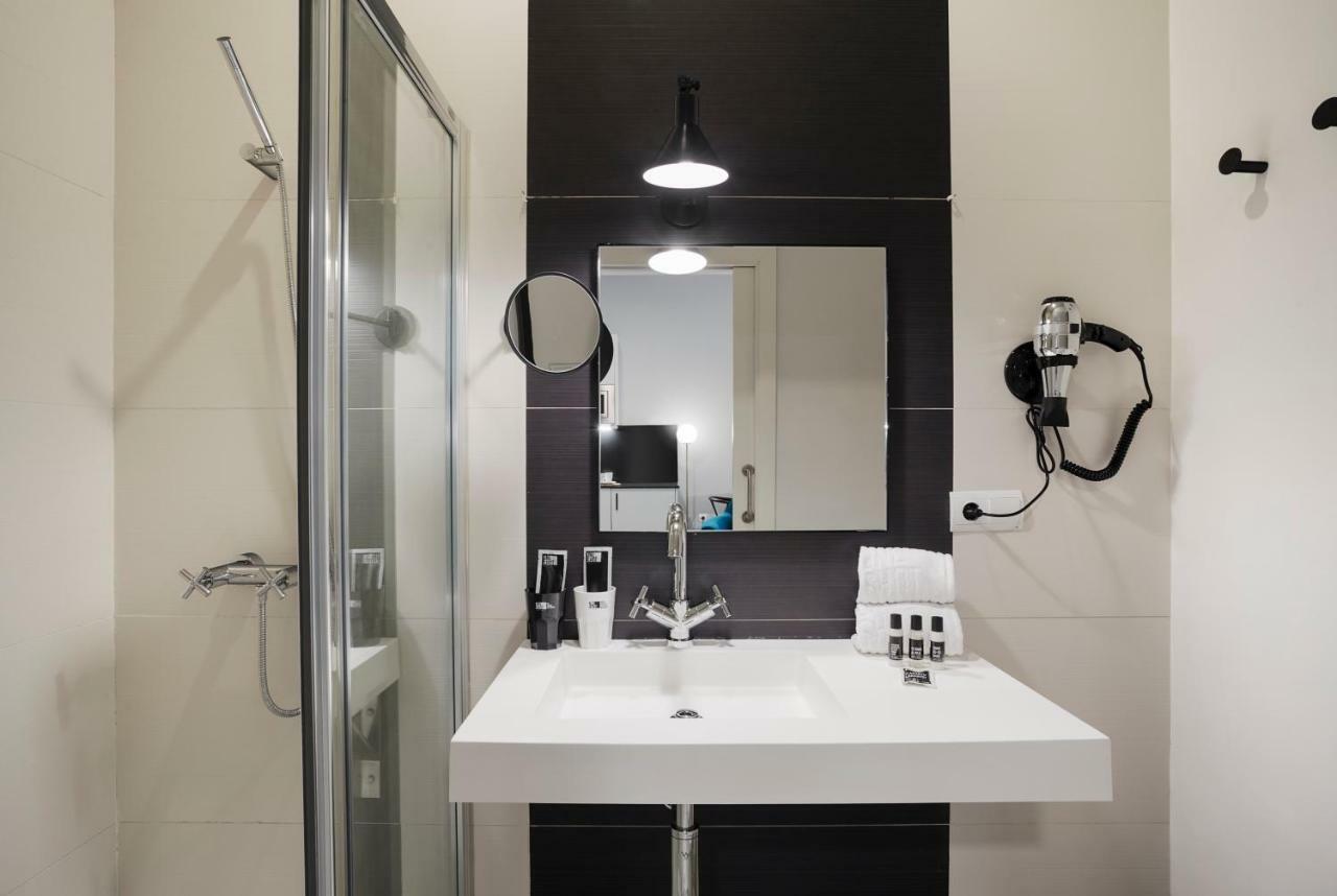 Apartamentos One Shot Conde De Torrejon Sevilla Buitenkant foto