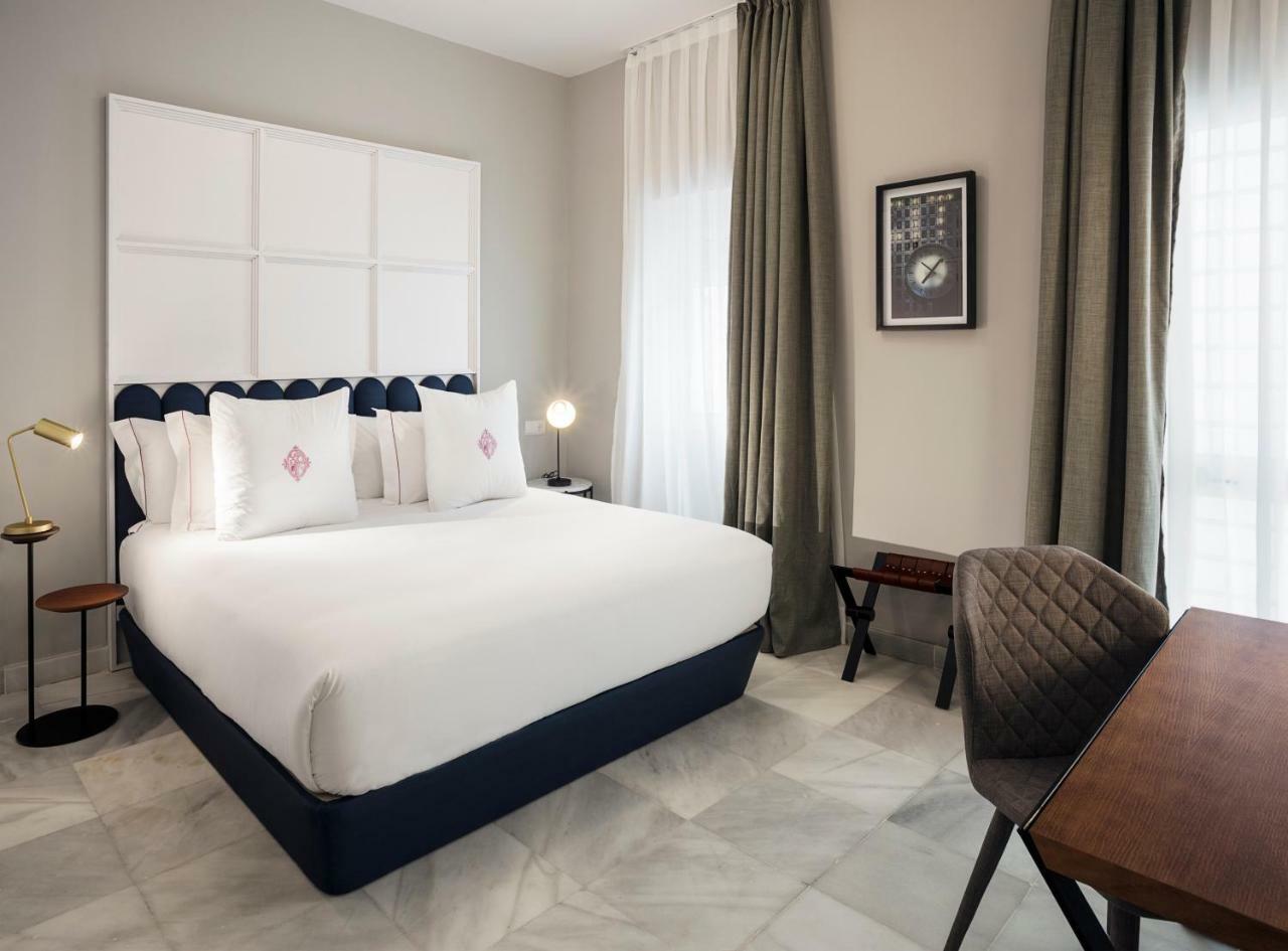 Apartamentos One Shot Conde De Torrejon Sevilla Buitenkant foto