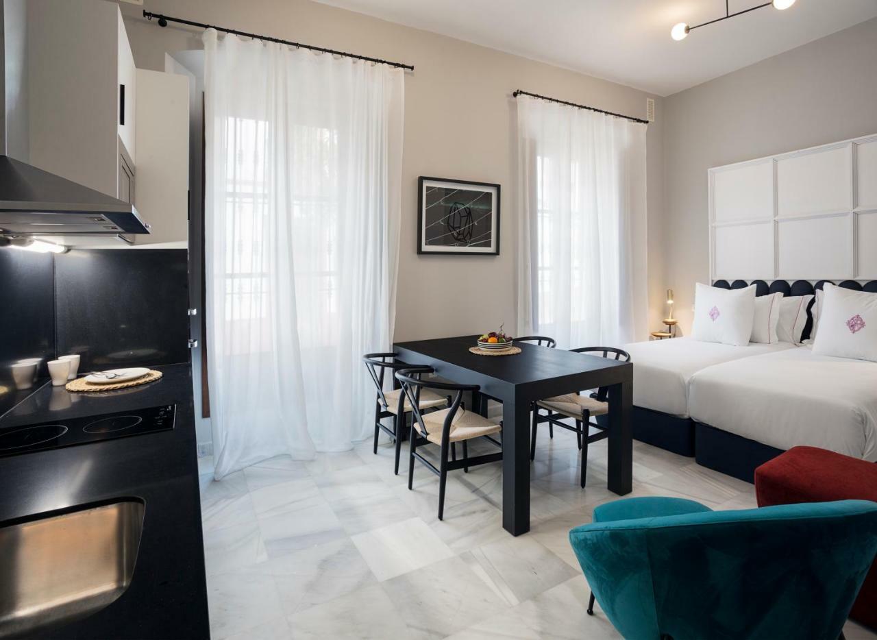 Apartamentos One Shot Conde De Torrejon Sevilla Buitenkant foto