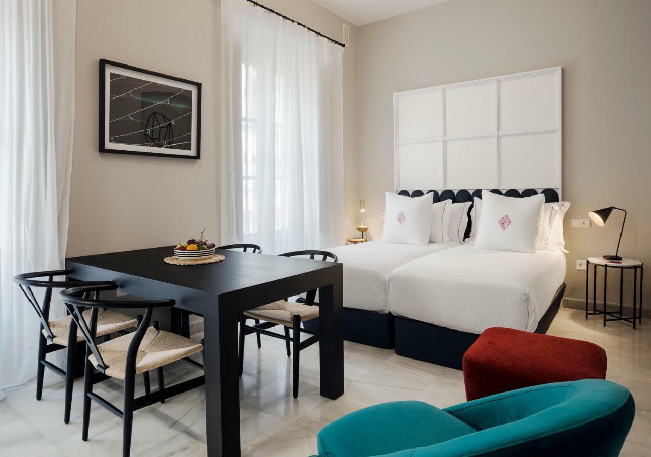 Apartamentos One Shot Conde De Torrejon Sevilla Buitenkant foto